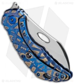 Olamic Cutlery Busker Largo Knife Blue Volcanic Ti/Funky Holes (2.5" Satin) 6 Olamic Cutlery Busker Largo Knife Blue Volcanic Ti/Funky Holes (2.5" Satin) -Blade Vault Olamic Cutlery Busker Largo Blue Volcano Ti Funky Holes Satin BHQ 91571 jr side