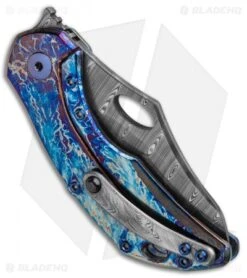 Olamic Cutlery Busker Semper Frame Lock Knife Blue Entropic Ti (2.5" Damasteel) -Blade Vault Olamic Cutlery Busker Semper FL Blue Entropic Ti Damasteel BHQ 97075 jr side