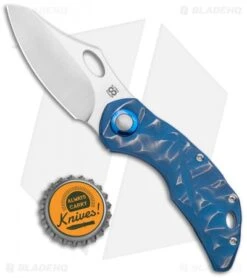 Olamic Cutlery Busker Semper Knife Blue Seabed Rocks Ti (2.5" Satin) 7 Olamic Cutlery Busker Semper Knife Blue Seabed Rocks Ti (2.5" Satin) -Blade Vault Olamic Cutlery Busker Semper FL Blue Seabed Rocks Ti 2 Satin BHQ 115950 jr bottlecap