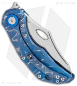 Olamic Cutlery Busker Semper Knife Blue Seabed Rocks Ti (2.5" Satin) 6 Olamic Cutlery Busker Semper Knife Blue Seabed Rocks Ti (2.5" Satin) -Blade Vault Olamic Cutlery Busker Semper FL Blue Seabed Rocks Ti 2 Satin BHQ 115950 jr side