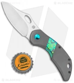 Olamic Cutlery Busker Semper Frame Lock Knife Dark Ti / Timascus (2.5" Satin) 7 Olamic Cutlery Busker Semper Frame Lock Knife Dark Ti / Timascus (2.5" Satin) -Blade Vault Olamic Cutlery Busker Semper FL Dark Ti Timascus Satin BHQ 116079 jr bottlecap